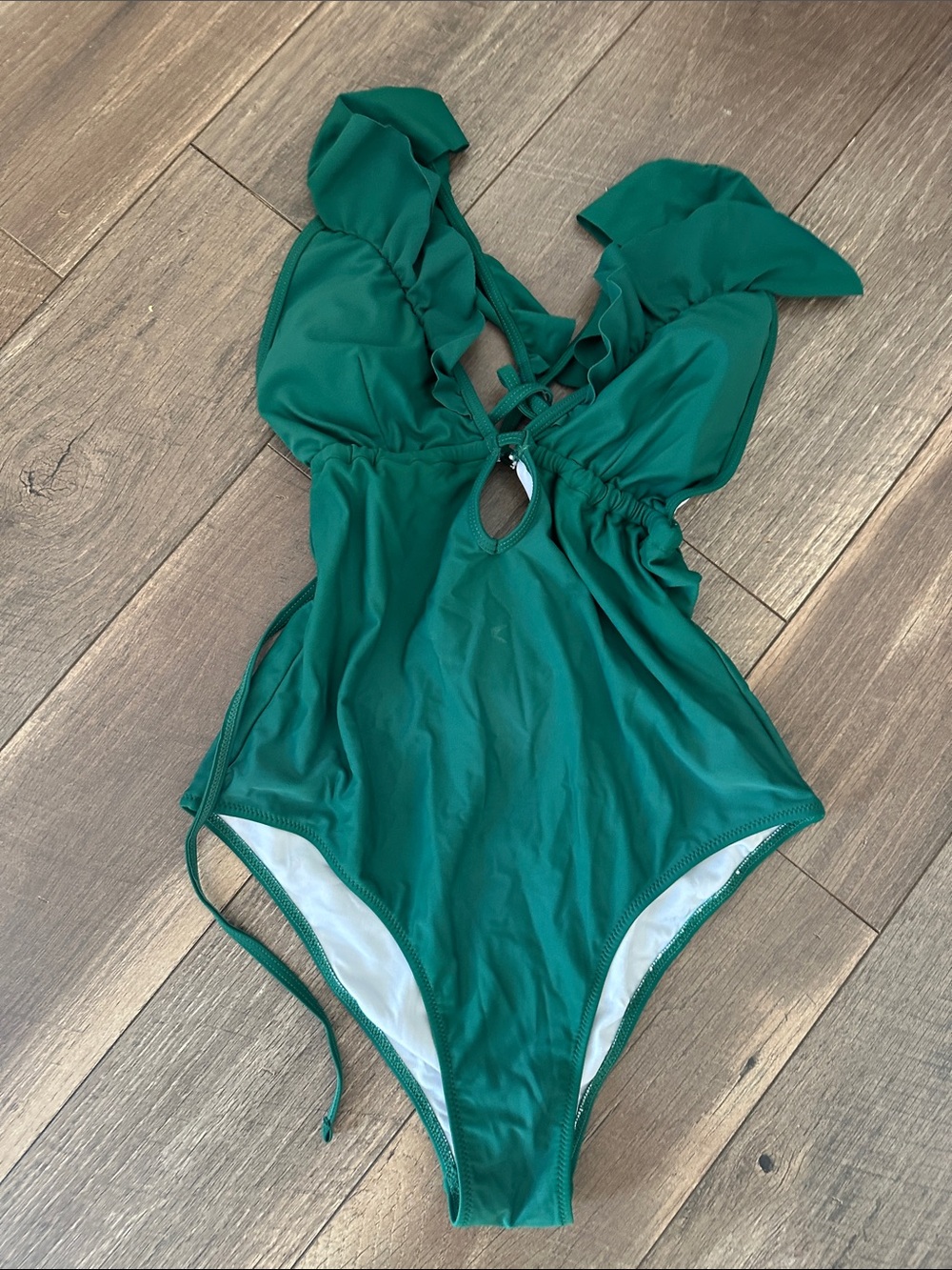 Green one piece bathing suit
